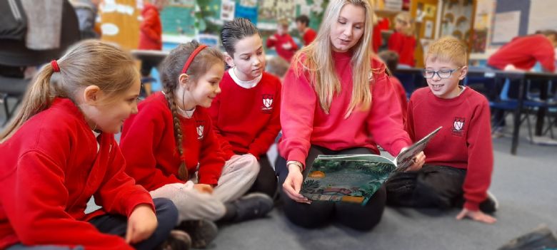 teacher reading to children