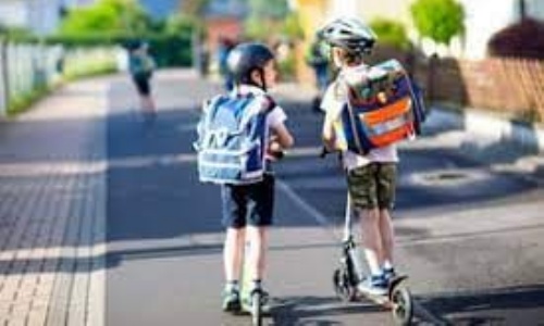 children traveling to school